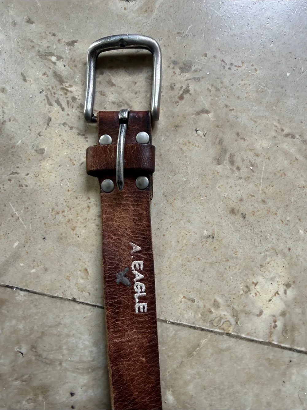 Men’s leather belts (3)  one American Eagle, one dickies and one no brand all 38